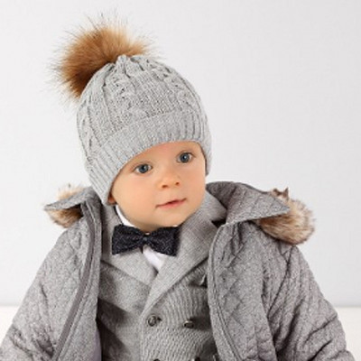 Шапка вязанная с меховым помпоном. 